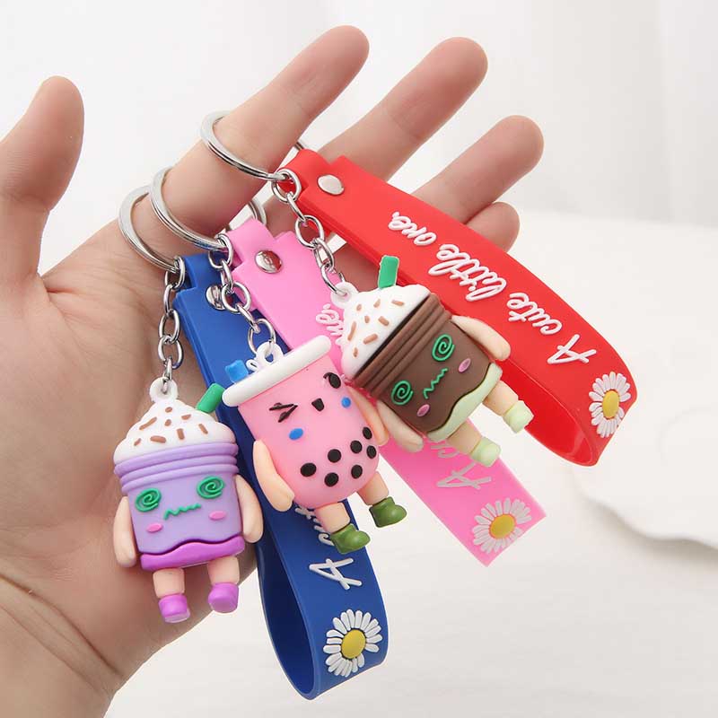Adorable Blinking Milk Tea Cup Doll Keychain - Ideal Backpack Pendant for Students