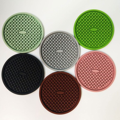 Professional terminology translation of the product title: 10cm Diameter Textured Grid-shaped Silicone Coasters, Food-grade